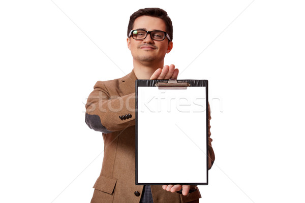 Stock photo: Young business man holding a clip board over white background