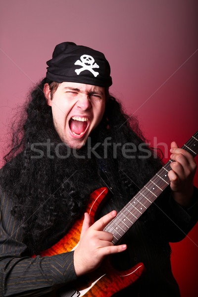 Rock pirate with guitar  Stock photo © Massonforstock