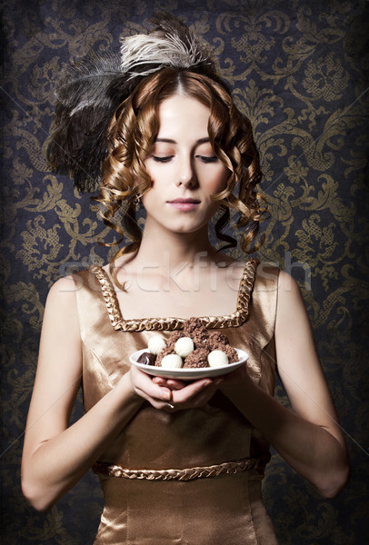 Empire girl with candy. Stock photo © Massonforstock