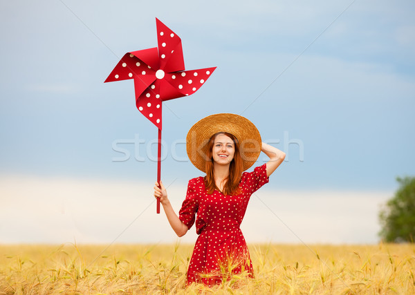 Ragazza giocattolo turbina eolica nubi donne Foto d'archivio © Massonforstock