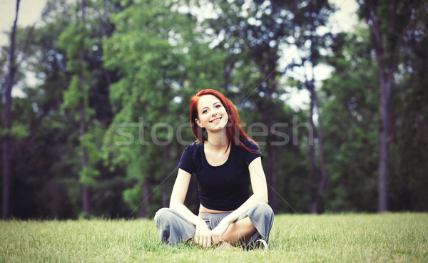 Joven indie estilo ropa hierba verde parque Foto stock © Massonforstock