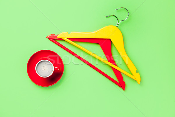 photo of cup of coffee and colorful hangers on the wonderful gre Stock photo © Massonforstock