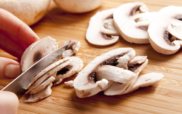 Mushrooms cutting Stock photo © Massonforstock