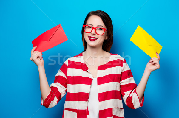 smiling woman with two envelopes Stock photo © Massonforstock