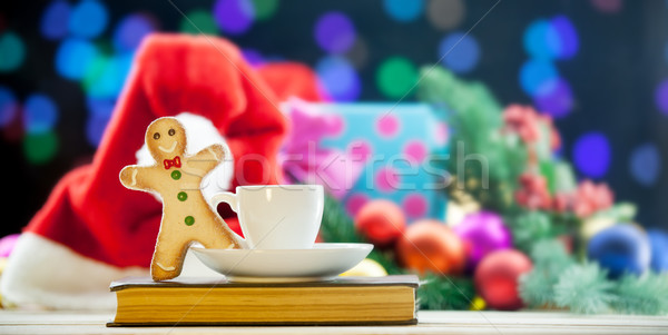 Cup with gingerbread and book Stock photo © Massonforstock