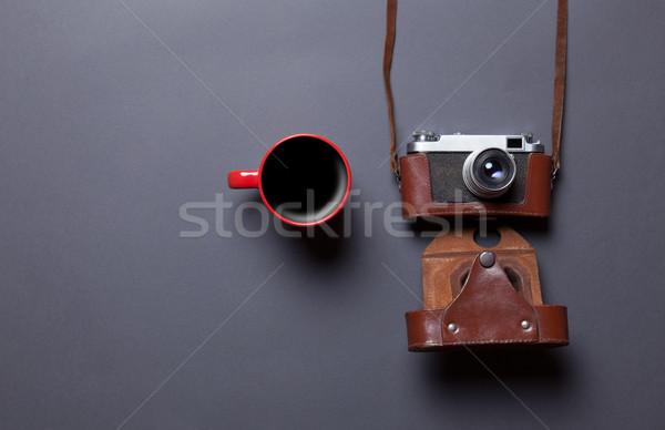 cup of coffee and retro camera Stock photo © Massonforstock