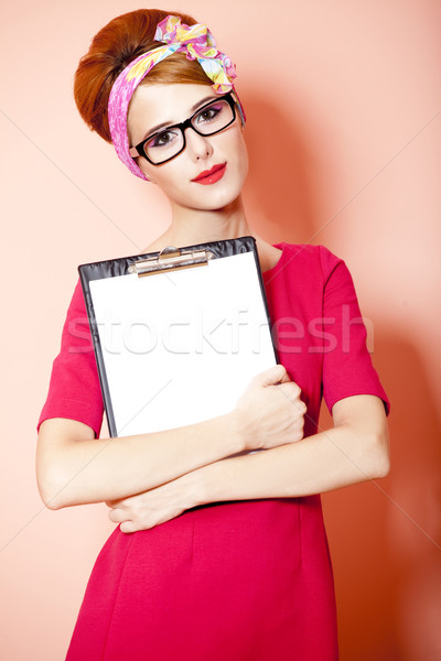Stílus vörös hajú nő lány szemüveg tábla rózsaszín Stock fotó © Massonforstock