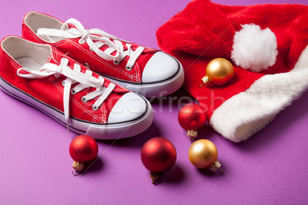 Stock photo: Gumshoes and Santas hat o