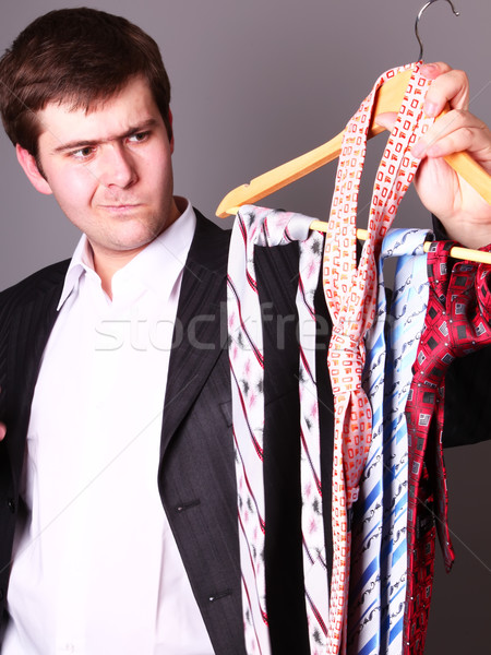 Businessman can't select a tie  Stock photo © Massonforstock