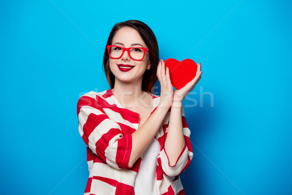 smiling woman with heart shape box Stock photo © Massonforstock