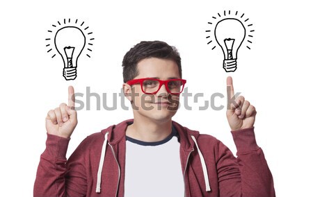 Young men hold finger on abstract idea lamp. Stock photo © Massonforstock