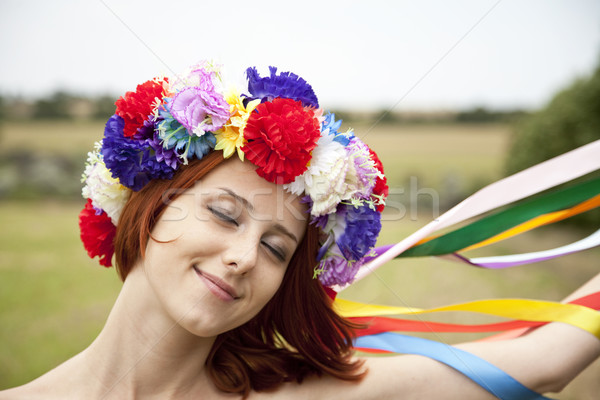 Slav girl with wreath at field Stock photo © Massonforstock