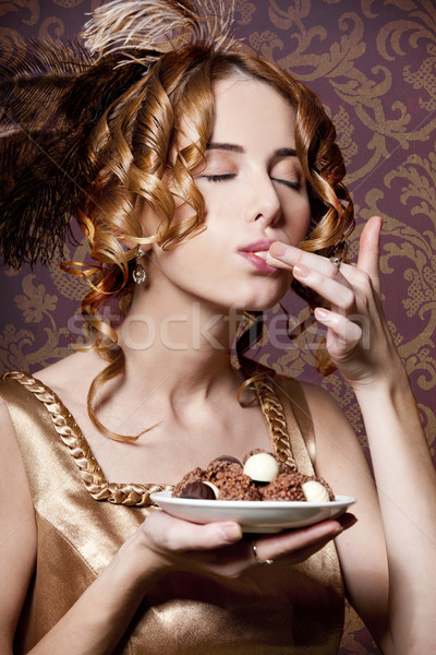 Empire girl with candy. Stock photo © Massonforstock