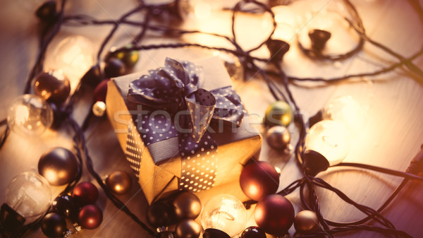 Karácsony ajándék tündér fények körül szeretet Stock fotó © Massonforstock