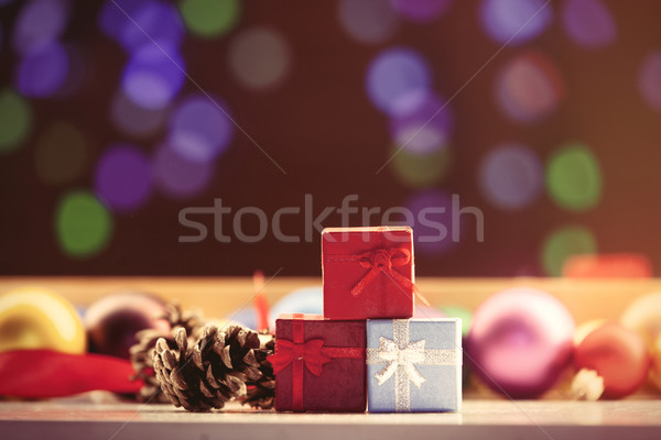 Christmas gifts and pine cone Stock photo © Massonforstock
