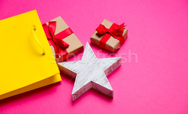 Stock photo: cute gifts, star shaped toy and shopping bag on the wonderful pi