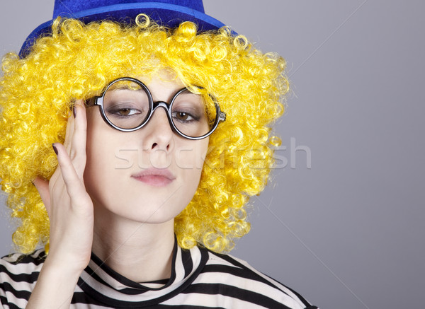 Yellow-haired girl in blue cap and striped knitted jacket.  Stock photo © Massonforstock