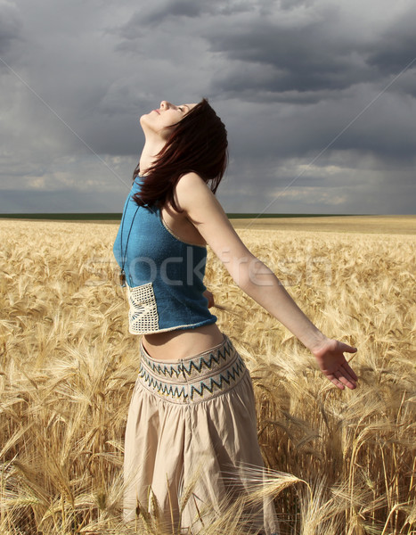Dziewczyna pole pszenicy burzy dzień charakter deszcz Zdjęcia stock © Massonforstock