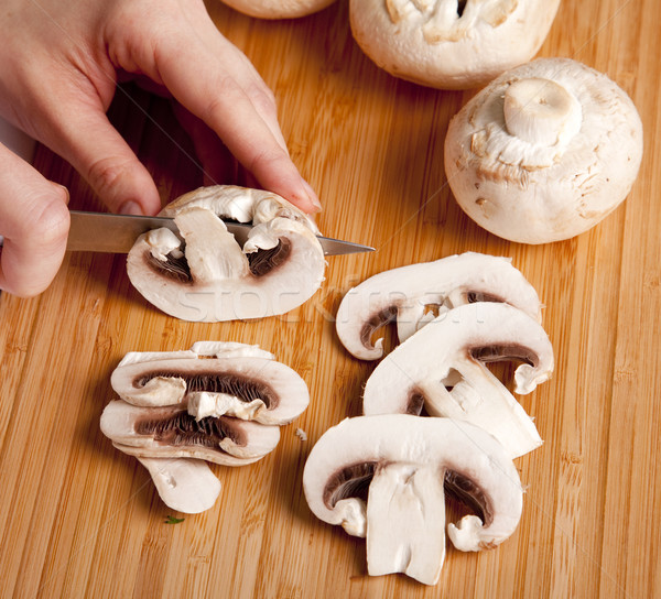 Mushrooms cutting Stock photo © Massonforstock