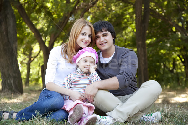 Stock photo: Young family at outdoor. Spring