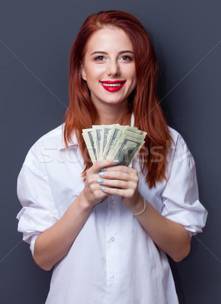 Stock photo: businesswomen in white shirt with money