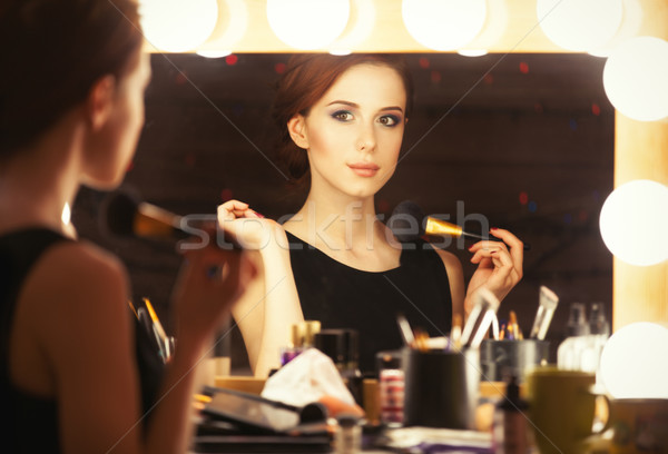 Porträt schöne Frau Make-up Spiegel Foto Stock foto © Massonforstock