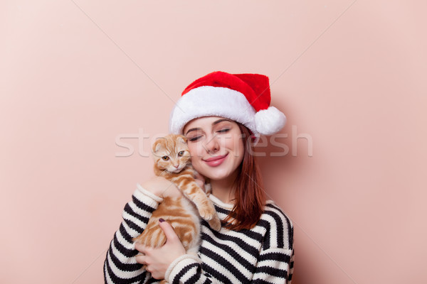 ストックフォト: 女性 · 猫 · 肖像 · 小さな · 赤毛 · サンタクロース