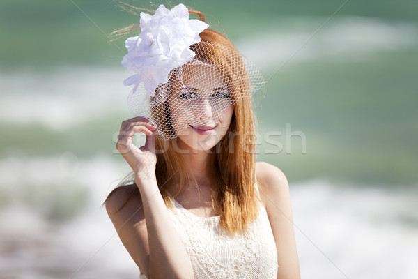 Young bride at the beach Stock photo © Massonforstock