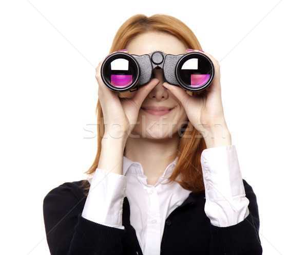 Business women seeking with binocular Stock photo © Massonforstock