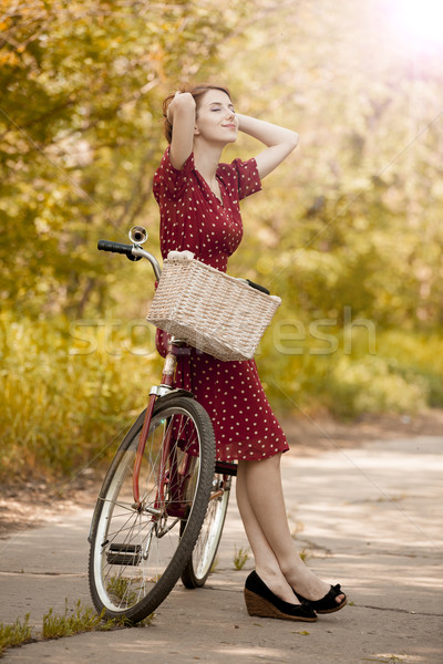 Beautiful girl with bike at countryside. Vintage. stock photo Massonforstock 2950267 Stockfresh