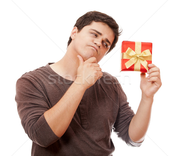 A man holding present box on white background. Stock photo © Massonforstock