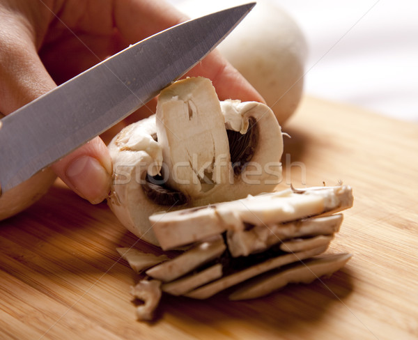 Mushrooms cutting Stock photo © Massonforstock