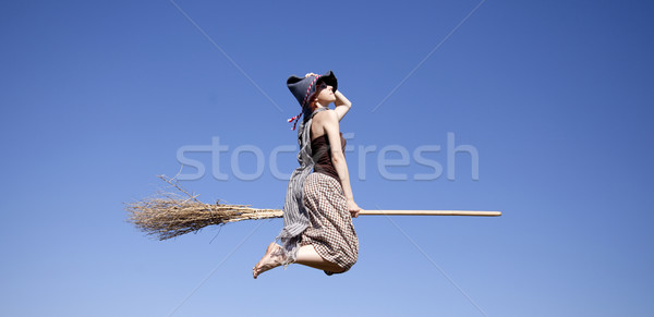 Jungen Hexe Besen unter Himmel Mädchen Stock foto © Massonforstock