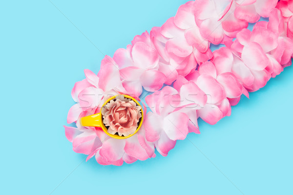 beautiful hawaiian lei and rose in yellow cup on the wonderful b Stock photo © Massonforstock