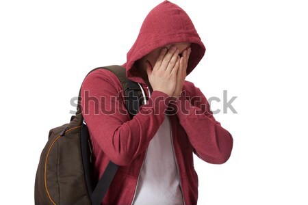 Young sad teenage boy  isolated on white background Stock photo © Massonforstock