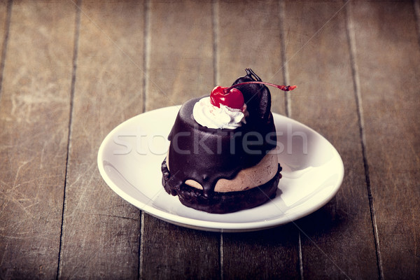 Cherry cake. Photo in old vintage color image style. Focus on ch Stock photo © Massonforstock