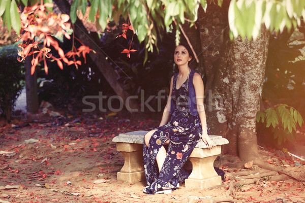 Nő kert fiatal nő virágoskert nyár pihen Stock fotó © Massonforstock