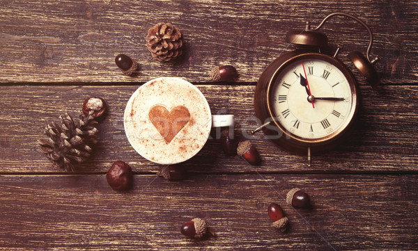 Cup of coffee and alarm clock Stock photo © Massonforstock