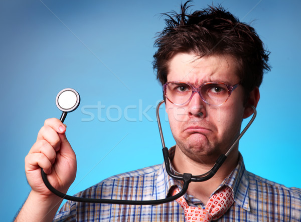 Funny M.D. with statoscope  Stock photo © Massonforstock
