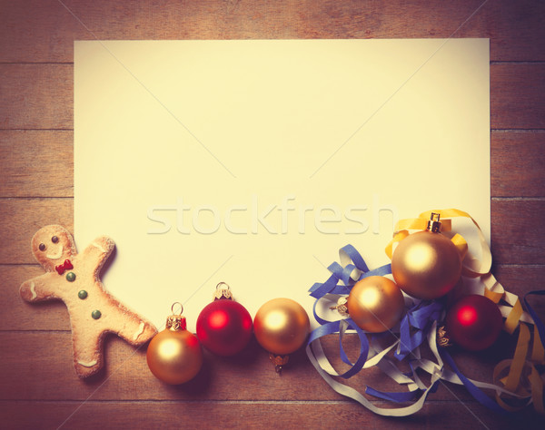 Stock photo: papaer and christmas toys with gingerbread man