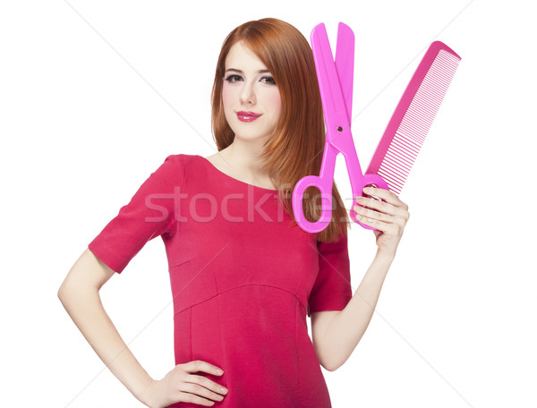Redhead girl with big scissors and comb Stock photo © Massonforstock