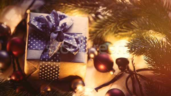 Christmas gift and fairy lights Stock photo © Massonforstock