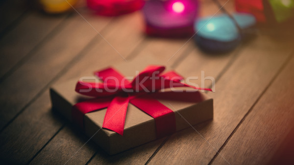 beautiful colorful heart shaped garland and cute gift lying on t Stock photo © Massonforstock