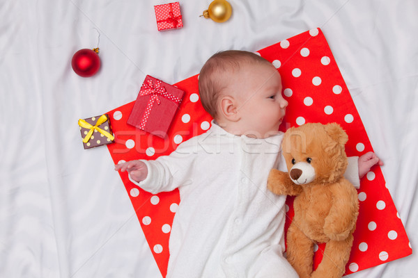 Pequeño bebé Navidad regalos osito de peluche blanco Foto stock © Massonforstock