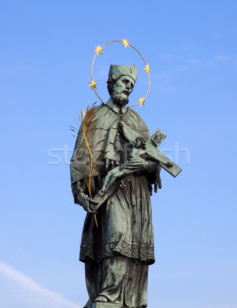 Prague - Statue of Jan Nepomucky on Charles Bridge and Hradcany Stock photo © Massonforstock