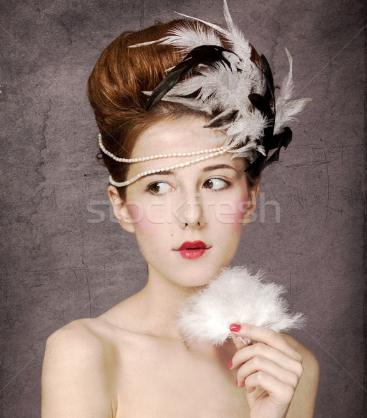 Redhead girl with Rococo hair style at vintage background.  Stock photo © Massonforstock