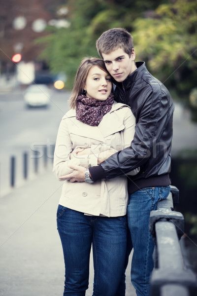 Stock photo: Young couple at the street.