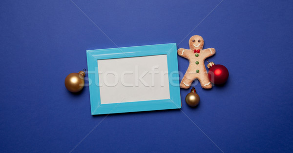 Gingerbread man and photo frame  Stock photo © Massonforstock