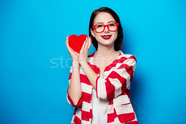 smiling woman with heart shape box Stock photo © Massonforstock