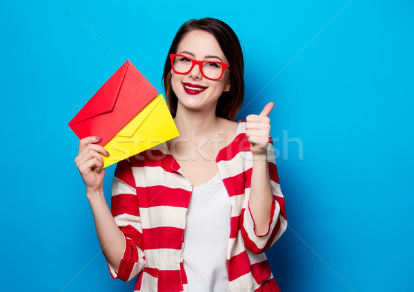 smiling woman with two envelopes Stock photo © Massonforstock